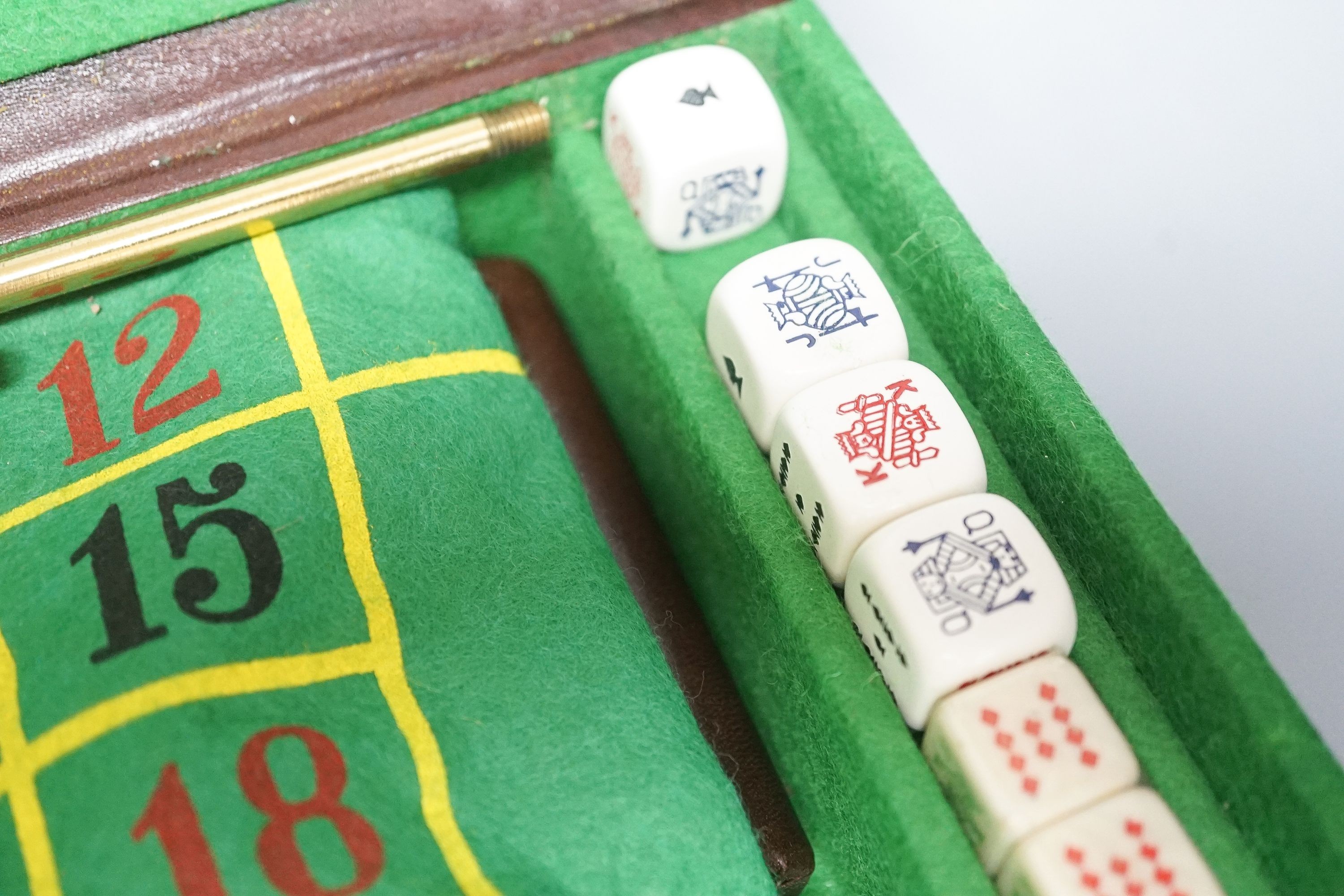 An Asprey tan leather cased games box